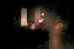 the hornet talking to a strange big lipped creature in Silksong.